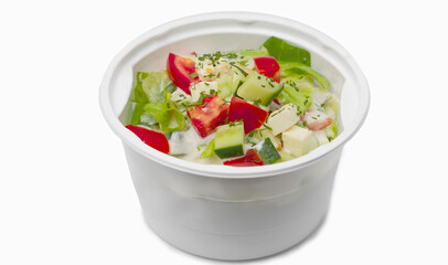 Delicious greek salad with tomatoes,and feta cheese isolated on white