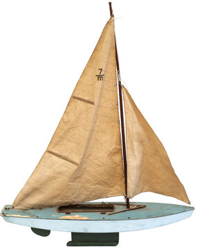 Wooden toy sailing boat on transparent background 