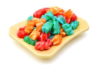 Handful of jelly bears on white background 
