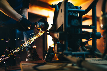 Motorcycle repair. Disassembled motorcycle. Fixing motorcycle standing in repair shop. Instruments and equipment. 