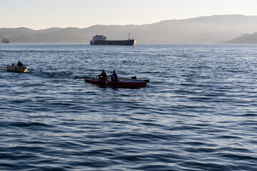 People rowing in the Bosphorus in the morning