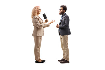 Female reporter interviewing a man