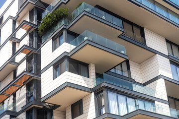 View on balconies of modern apartments exterior at daylight