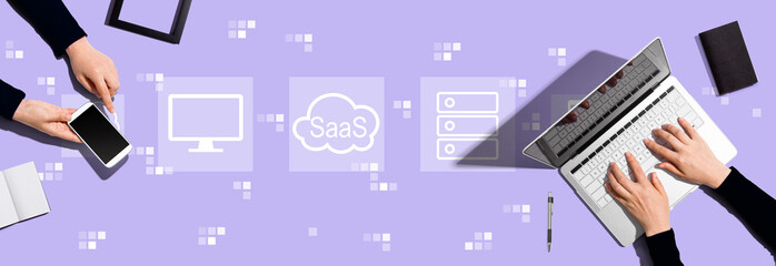 SaaS - software as a service concept with two people working together