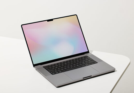 Laptop Mockup on White Desktop