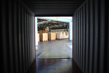 working at The Warehouse. Storehouse area, Shipment.  warehouse worker unloading pallet goods in warehouse