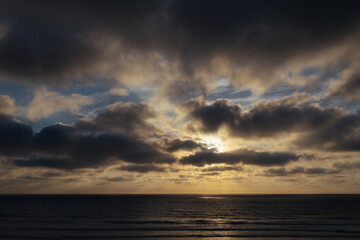 cloudy dramatic sunset over the Atlantic Ocean 
