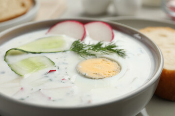 Delicious cold summer soup in bowl, closeup