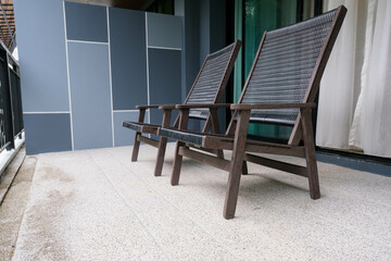 Fototapeta na wymiar Beautiful terrace or balcony with rattan chair for tourists to relax.