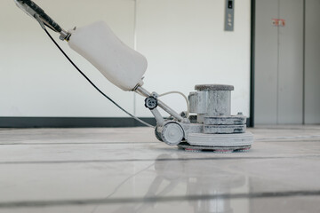 Fototapeta na wymiar cleaning floor with machine 