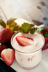 Healthy food of yogurt, Strawberry Yogurt,yogurt with fresh strawberry, wood background