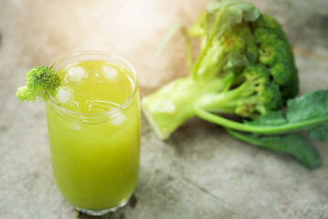 Glass of broccoli juice, broccoli Healthy drink on dark back ground, Green vegetable smoothie