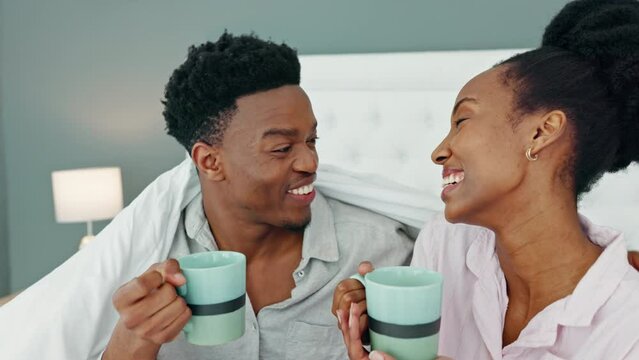 Bed, morning and couple together with mug of coffee to talk about good news and surprise in home. Wow, omg and happy announcement from black woman in married relationship with support and love.