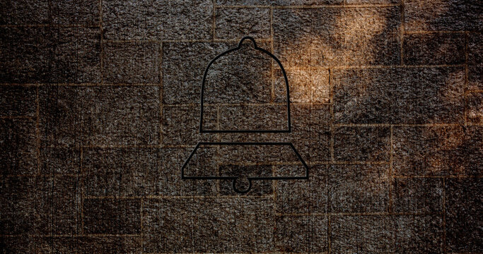 Image of glowing neon bell icon on brick wall