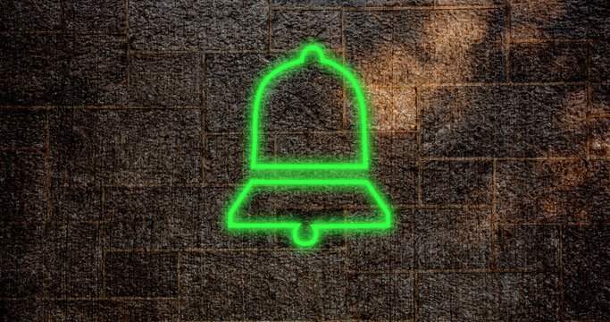 Image of glowing neon bell icon on brick wall