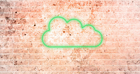 Image of glowing neon cloud icon on brick wall