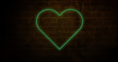 Image of glowing neon heart icon on brick wall