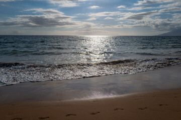 Summer vacation at a tropical beach. Paradise beach with sand and clear water of the sea. Ocean beach background.