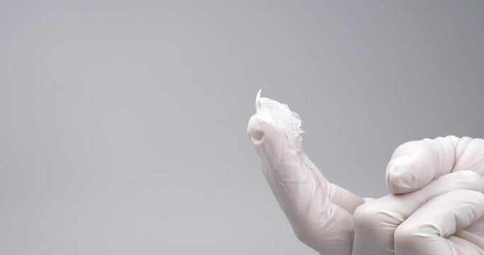 urologist appointment concept, lubricant on the fingers of a doctor in gloves,massage prostate High quality 4k footage