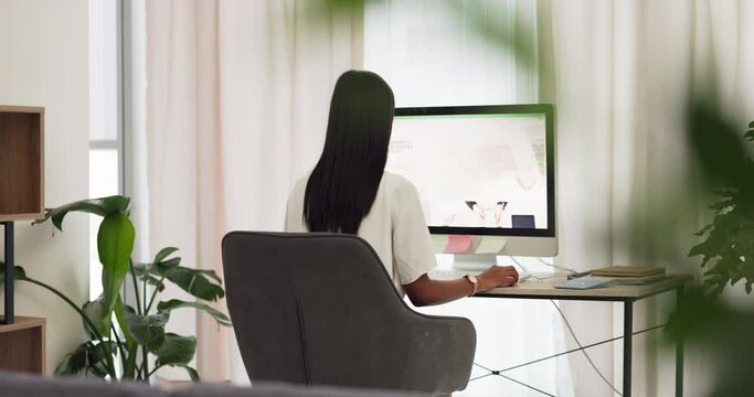 Creative website designer woman at computer or desktop pc working on internet SEO for digital marketing agency. Remote, work from home girl or freelance copywriter employee of online tech company