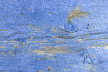 Old board painted with blue paint