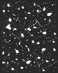 Grunge texture. Paint splatter. White drops, on a black background. Grunge background. vector textured effect. vector illustration. Spray the watercolor.