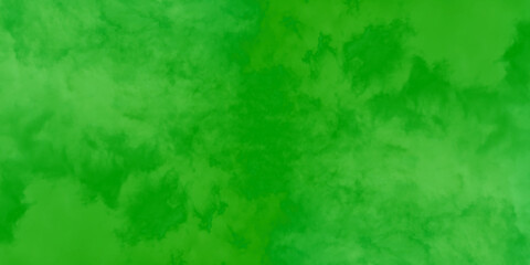 Abstract grainy green paint background, old-style green grunge texture,  scratched and grainy green paper texture, Green grainy chalkboard or cardboard texture, green background with scratches.