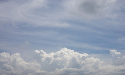 Naklejka na ściany i meble The sky and the clouds gathered on a clear day.