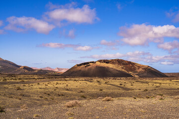 Fototapeta na wymiar View of the incredible El Cuervo volcano. Photography made in Lanzarote, Canary Islands, Spain.