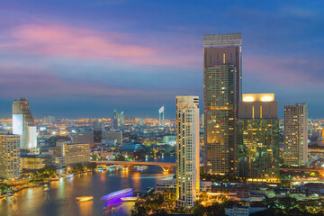 Bangkok city skyline. Landscape of building at Bangkok central business around the Chao Phraya river. Aerial view of Thailand modern building in business district area.