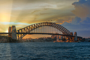 Naklejka premium Sunset at Sydney Harbour Bridge located at Australia Landscape of building at Sydney central business around the harbour. Aerial view of Sydney business building at dusk.