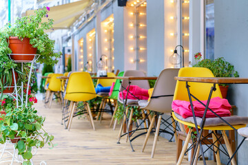 Summer cafe on the street. Tables and chairs without people.