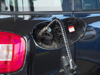 Cars being charged at LPG liquid gas stations