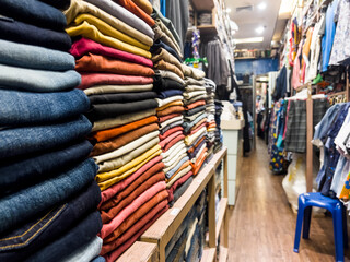 Jeans and Fashion Clothes in clothing store, at Thailand.