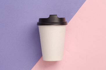 Mockup White Blank Take Away Coffee Cup on purple pink background. Top view