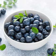 Blueberry with leaves in a bowl