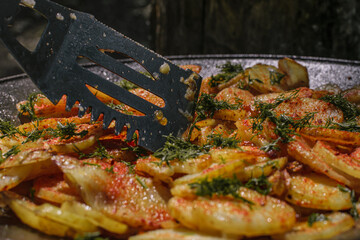 fried potato in a cauldron