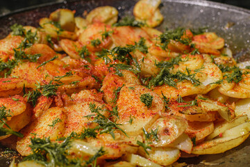 fried potato in a cauldron