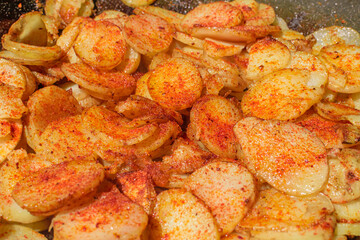 fried potato in a cauldron