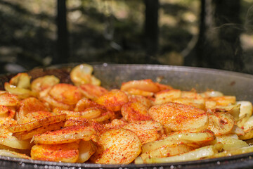 fried potato in a cauldron
