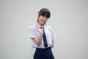 Portrait of thai Junior high school student uniform beautiful girl ok