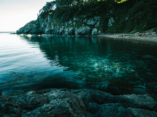 Rocky shore of Japanese sea in summer.