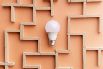 light bulb led in a maze of blocks