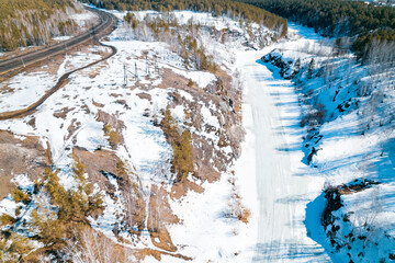 aerial photography frozen river and forest, ice on the river and trees