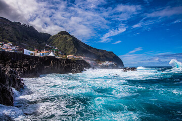 waves crashing on rocks