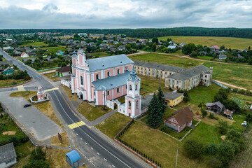Fototapeta na wymiar aerial view on baroque temple or catholic church in countryside