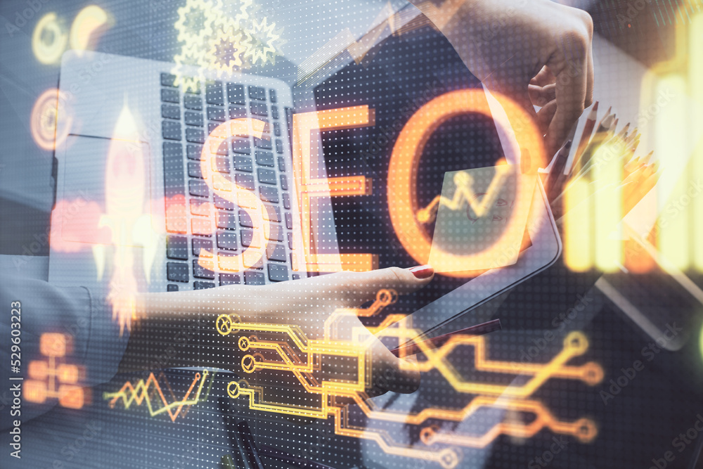 Poster double exposure of woman hands working on computer and seo hologram drawing. internet search concept