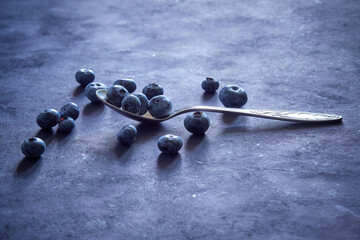 Fresh ripe blueberries on a dark background