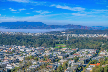 Fototapeta na wymiar Downtown San Francisco California aerial view with mountains and blue sky