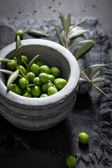 Healthy and fresh raw olives freshly picked in garden.